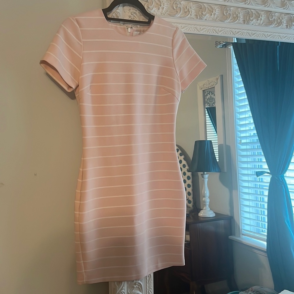 Likely pink stripped dress size 4 runs way smaller (s/m).  Fits like a 0.